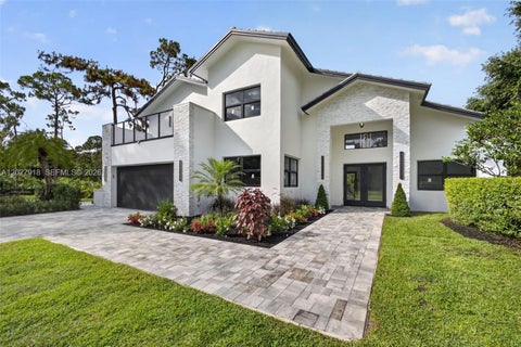 Photo of 12725 Mallard Creek Dr, Palm Beach Gardens, FL 33418 (MLS # A12027918)