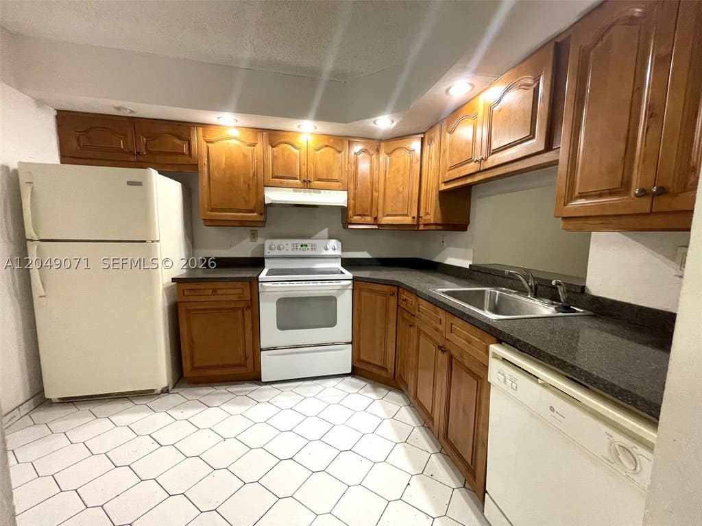 Photo of 1800 SW 81st Ave #1111, North Lauderdale, FL 33068 (MLS # A12049071)