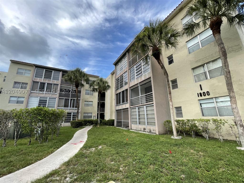Photo of 1800 SW 81st Ave #1111, North Lauderdale, FL 33068 (MLS # A12049071)
