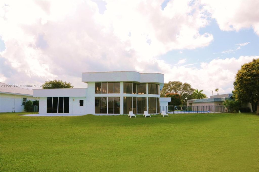 Photo of 6003 Umbrella Tree Ln, Tamarac, FL 33319 (MLS # A11901867)