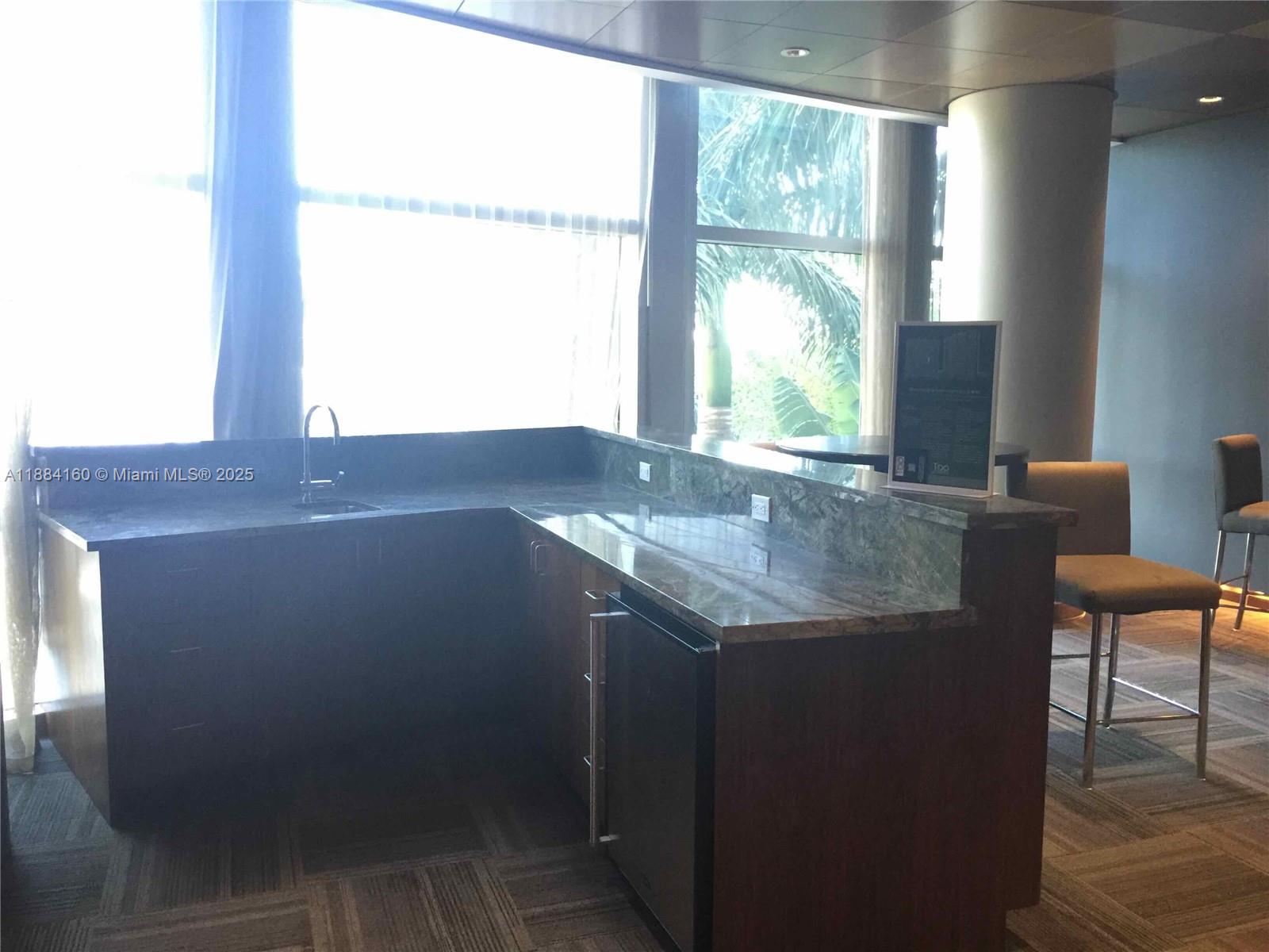TAO SAWGRASS CONDOMINIUM - Residential Lease