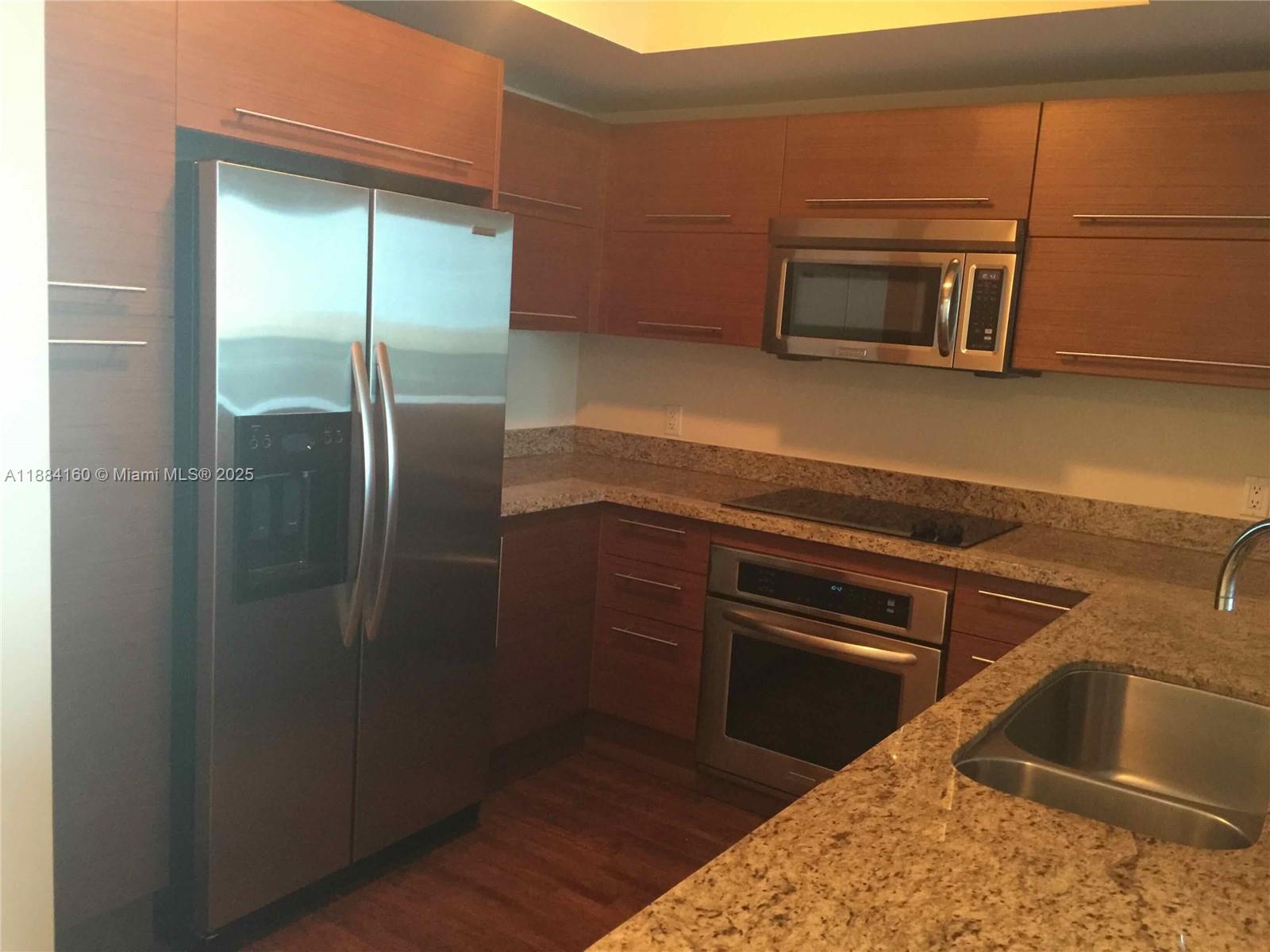 TAO SAWGRASS CONDOMINIUM - Residential Lease