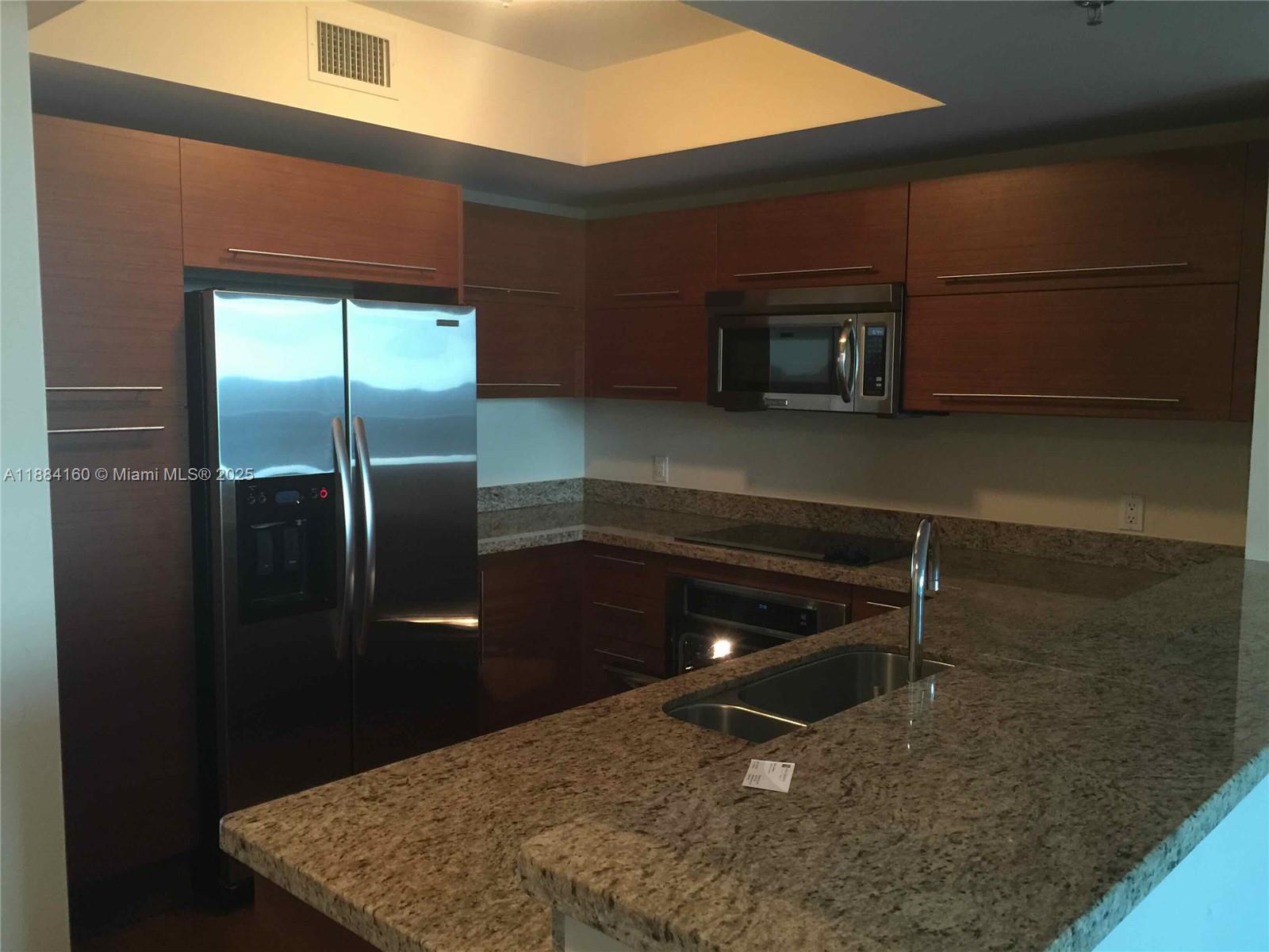 TAO SAWGRASS CONDOMINIUM - Residential Lease
