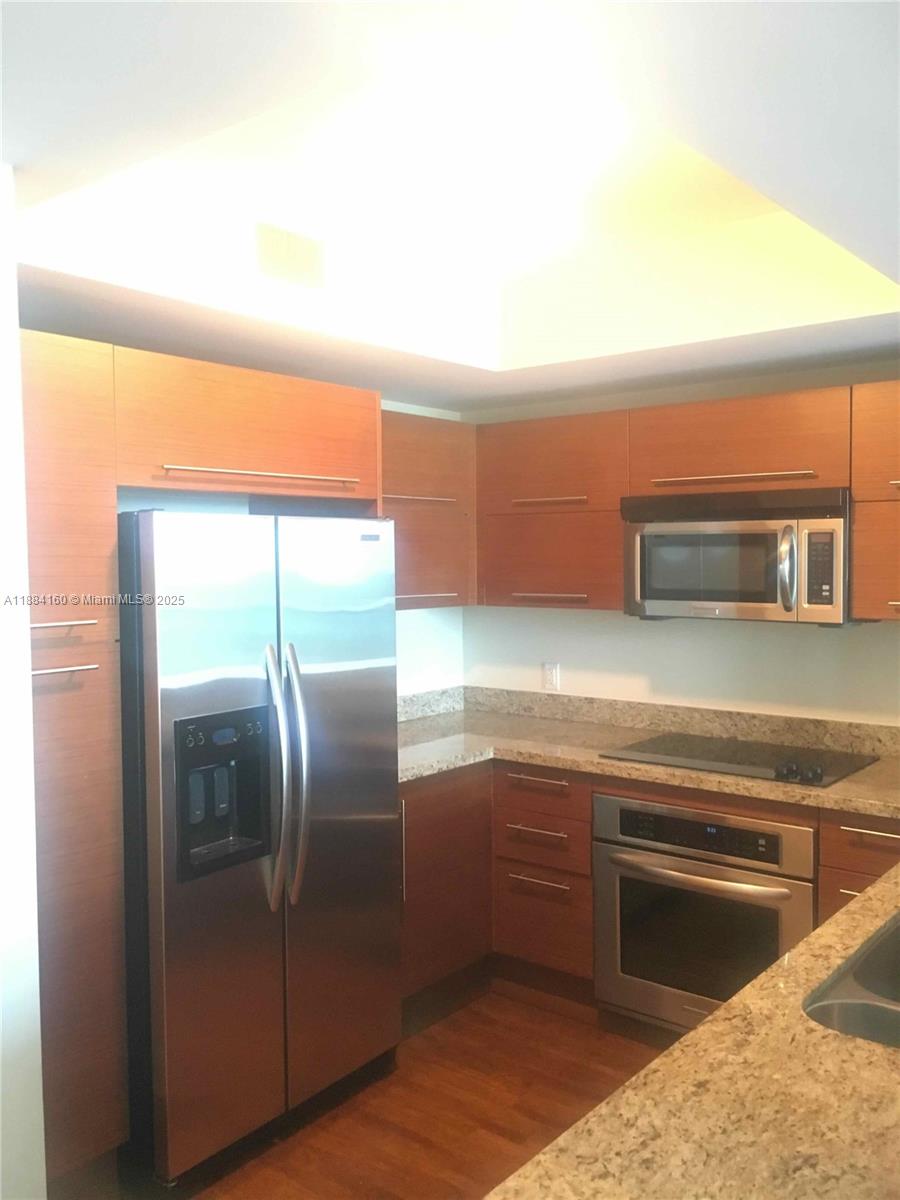TAO SAWGRASS CONDOMINIUM - Residential Lease