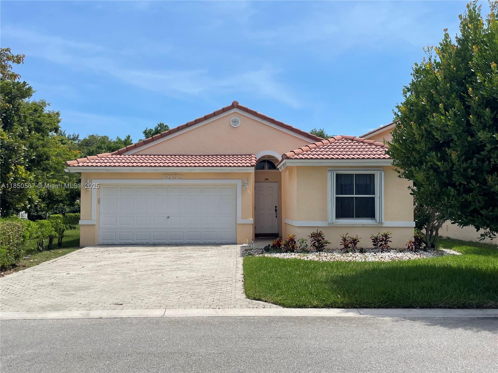 Step into this cozy 3/2 gem in the sought-after Wyndham Lakes in Coral Springs. Add your personal touch and creativity to make this your home which boasts vaulted ceilings, bay window in the breakfast nook, stainless steel appliances, pantry, linen closets, all laminate and tile floors, roman tub and walk-in closet in the primary suite, driveway pavers, according shutters, tile roof and plenty of space for a pool. Plus, it is a gated, all-age community with A-rated schools. Walking and bike trails throughout the pet-friendly Wyndham Lakes community. Don't pass on this rare gem!