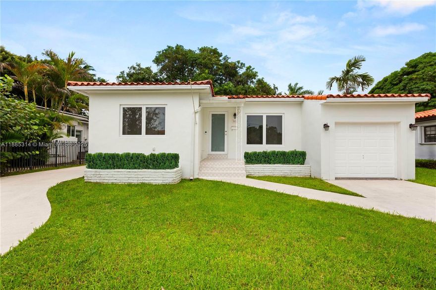 Updated 2-bedroom, 2-bath home with large family room in a prime location, just blocks from Miracle Mile and The Plaza. Impact windows and doors fill the spacious bedrooms and living areas with natural light. Recently refinished hardwood and terrazzo floors, along with exposed ceilings, add warmth and character. A rare 3-car garage provides exceptional storage for vehicles, boats, or flexible use.