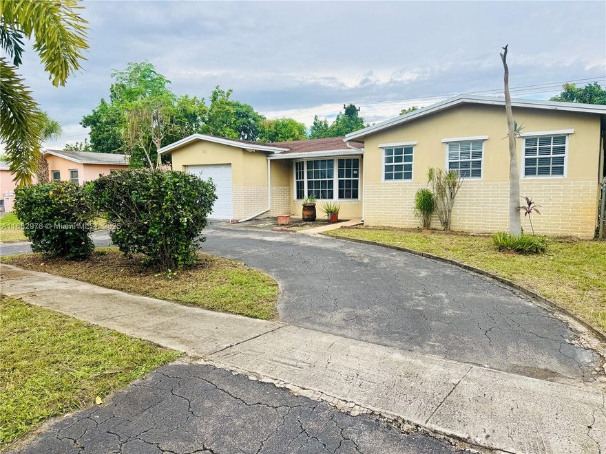 Spacious 3-bedroom, 2-bathroom home with just under 1,800 sq ft of living area plus a closed and finished Florida room for extra space. Features include a large master bedroom, circular driveway, and solid layout with plenty of potential. Conveniently located near the Turnpike, 441, and Sunrise Blvd. Priced right and ready for your personal touch.