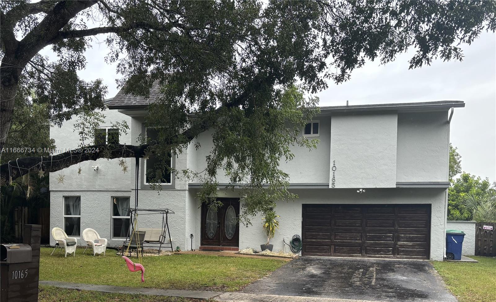 Prime Location! The perfect blend of comfort & convenience in this spacious 4-bdrm, 3.5-bath home in desirable Cooper City school district. Enjoy waterfront living w/ direct access to the lake. Beautiful 36x24 porcelain tile floors downstairs & laminate wood upstairs. Open floor plan features a new kitchen w/ wood cabinets, quartz countertops, & ss appliances. Cabana bath & powder room downstairs. All bedrooms upstairs, incl. the master suite w/ a walk-in closet & a private ensuite bathroom. The 2nd upstairs bathroom offers dual sinks & a combo shower & tub. Dual A/C units (approx. 6 y.o.) zoned upstairs & downstairs. Converted garage has a small office space w/garage door in working order. Roof replaced in 2015 & impact glass windows thru out. Automatic sprinklers use water from the lake.
