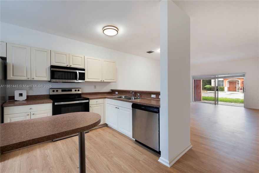 Step into this elegantly renovated 2-bedroom, 2.5-bath townhouse in the private, gated community of Solabella. The home showcases brand-new floors, fresh designer paint, and an open-concept layout filled with natural light. Each bedroom offers a private en-suite bath, while the stylish half bath downstairs adds convenience for guests. Enjoy resort-style amenities including a sparkling pool, clubhouse, fitness center, and secure entry. Perfectly situated near top dining, shopping, and major highways, this home blends luxury, comfort, and location. Whether for your personal retreat or an investment in a thriving Miami community, this townhouse is move-in ready and waiting for you.