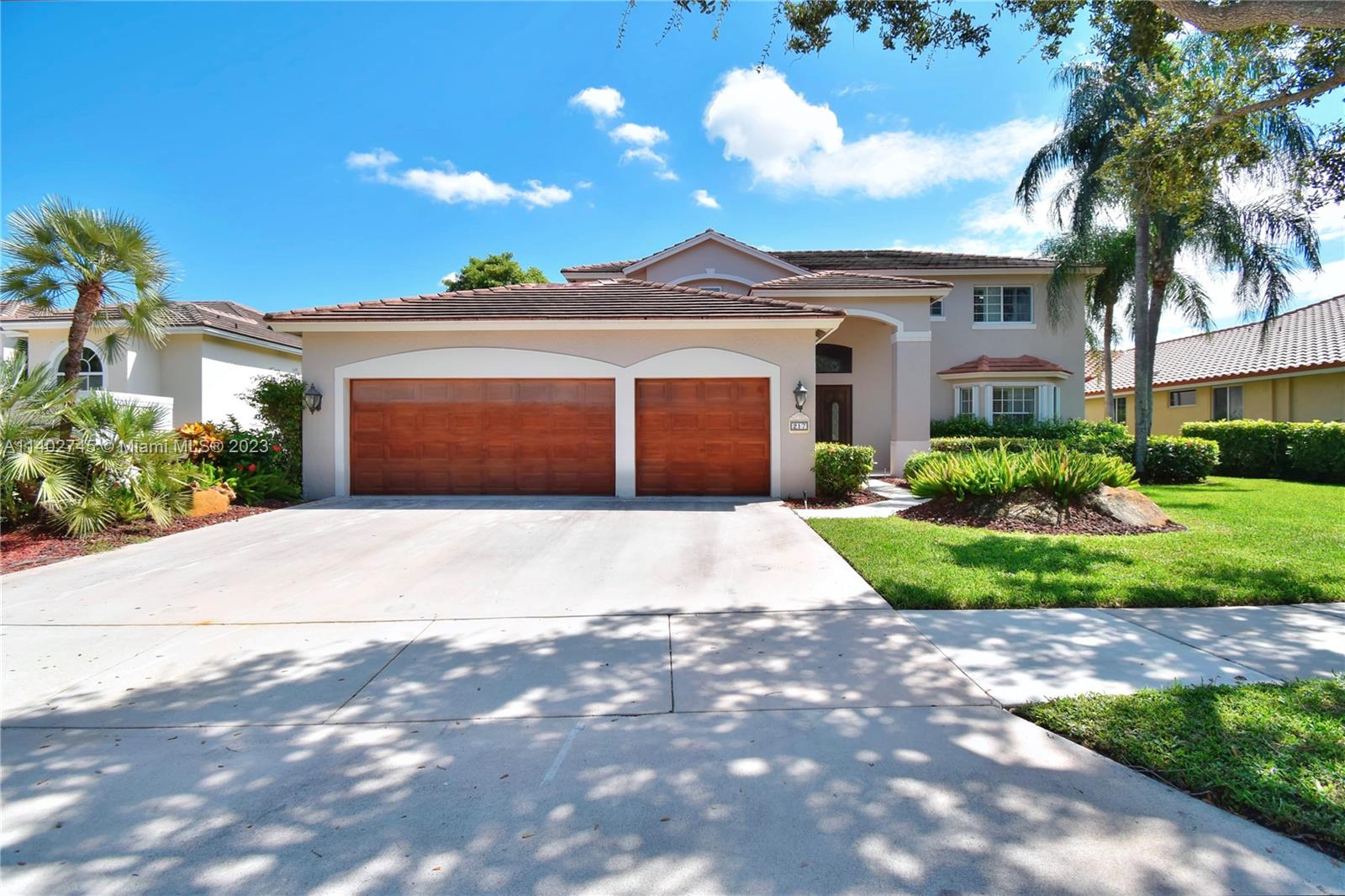 STUNNING BRAND NEW 2023 RENOVATION! Gorgeous 5/3/3CG modern The Landings home on SPECTACULAR 13,000+SF LAKEFRONT LOT/ POOL/, NEW ROOF being installed saving $ on insurance. NEWER IMPACT windows & doors! Backyard retreat is an entertainers delight NEW 2022 White kitchen w/ appliances, NEW Quartz counter/backsplash. 3 Remodeled bathrooms.Full security private neighborhood w/community park & playground. - fully hurricane rated enclosure. Lake frontage, Screened Pool, open floor plan (first floor). New hot water heater, New A/C ( 2020). This home captures plenty of natural light. Outdoors you'll find lush tropical landscaping, pool, covered patio area. Upstairs : Master bedroom and 3 extra bedrooms /Downstairs: 1 extra bed. TOP A+ REATED SCHOOLS. The community has Pickleball and Tennis court