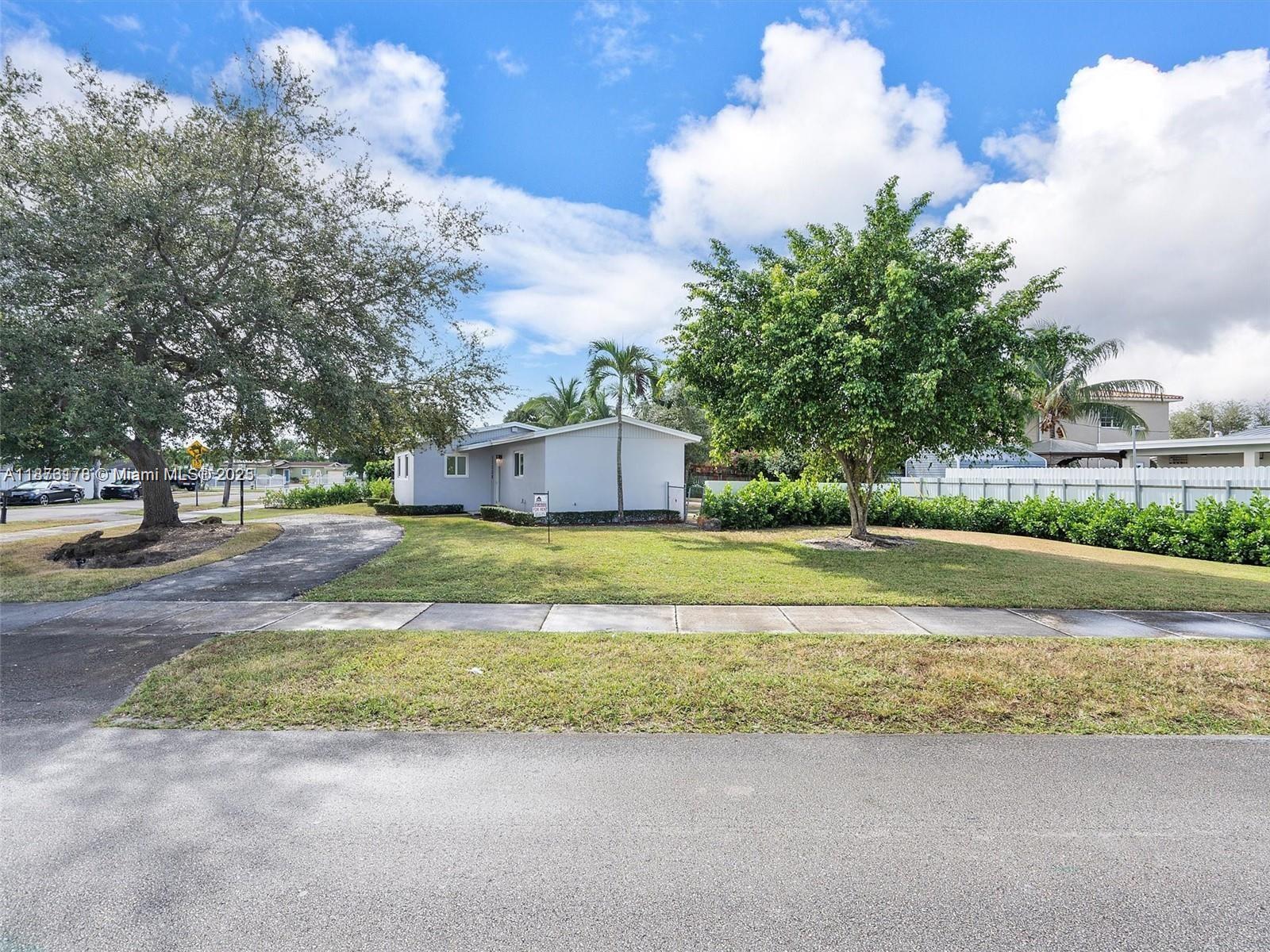 Charming Corner Lot Home 3-Bed / 2-bath split floor plan, home fully renovated and freshly painted with big backyard, pergola with summer kitchen, boat parking space along with working vehicles parking and circular driveway. Located in the great neighborhood of Palm Springs North, next to Miami Lakes and within close proximity to schools, shopping malls and groceries and great restaurants.
