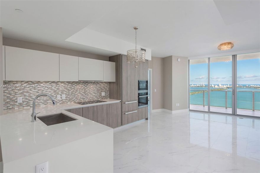 Live in East Edgewater's most exclusive luxury bayfront tower. Beautiful 2 bedroom + Den, 3 full baths on high floor. Direct Biscayne Bay views with Miami Beach and the Ocean in the backdrop. Miele and Subzero appliances, Snaidero kitchen, white quartz countertops. Incredible amenities- Tennis & Basketball courts, state of the art Fitness Center, Spa treatment rooms, sauna & steam rooms, private beach club with day beds, lounges, and individual cabanas, recreation rooms, two pools & hot tub – this is one of Edgewater’s most desirable and luxurious buildings. Currently tenant-occupied until September 2026. Please note that balconies will be closed estimated time frame is October 2025-February 2026.