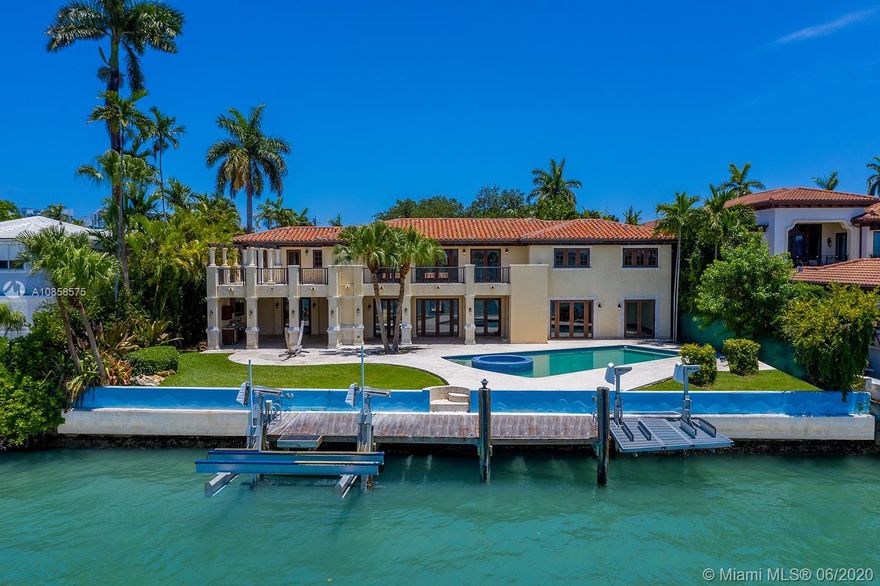 Experience the best views in Miami on this 25,215 SF lot. Incredible opportunity to live on coveted Upper North Bay Rd in this classic Pancoast waterfront estate. Offering 103 feet of sparkling waterfront on the wide bay, enjoy breathtaking bay and downtown Miami skyline views. With stunning views from every room, features include stone, marble and wood throughout, media room with a custom bar, principal suite with an oversized bathroom. The outdoors are perfect for entertaining complete with a heated pool with spa and a custom dock with boatlift. Available: Build your dream home with plans by renowned Brazilian architect, Marcio Kogan.