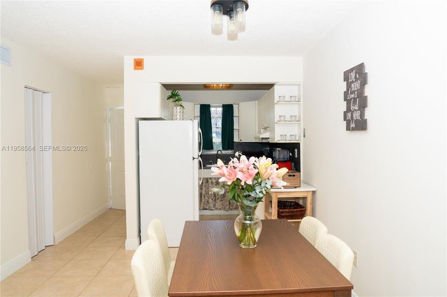 Step inside this cozy 2-bedroom, 1-bathroom first-floor condo located in the highly desirable Villa Biscaya Jardines Condominium Community. The unit features tile flooring throughout and a functional, contemporary kitchen and bathroom that were updated in prior years. While not fully remodeled with high-end finishes, the home is well maintained and move-in ready, offering a solid foundation for buyers to personalize or update to their taste. The well-proportioned floor plan provides comfortable living space, ideal for small families or investors. Two assigned parking spaces included. Conveniently located just east of LeJeune Road, with easy access to I-95, the Palmetto Expressway, and major highways, making commuting simple and efficient.