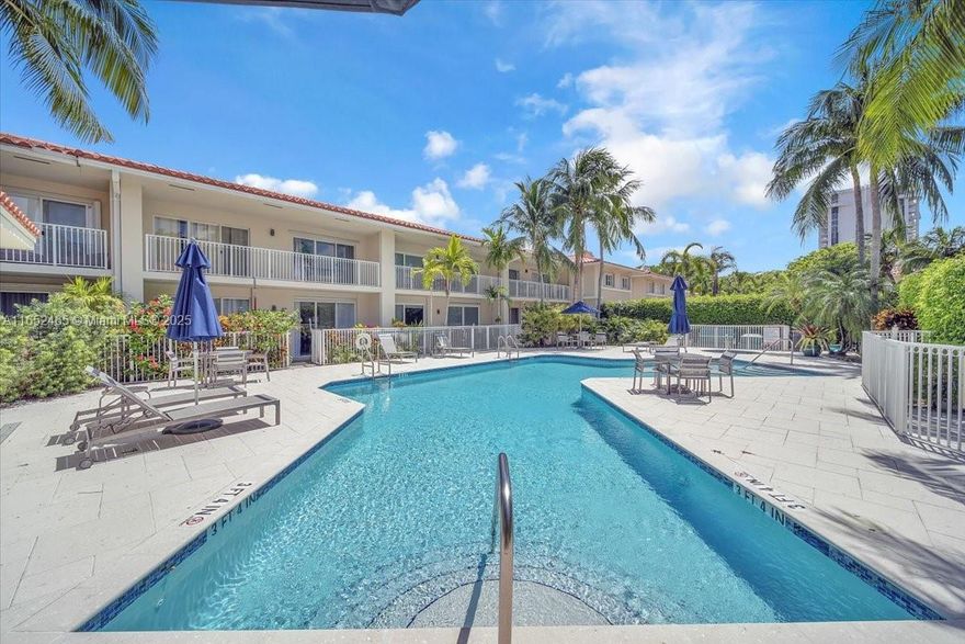 Imagine driving into a safe, secure, gated community surrounded by beautiful, colorful landscaping and grand concrete beams. This 34-acre waterfront community includes tennis courts and a marina, offering a secure and serene environment. The impressive 2-story pristine townhouse features impact windows and doors, bamboo flooring, and a spacious 3-bedroom, 3.5-bathroom unit with 2222 square feet and a two-car garage. The outdoor patio, perfect for entertaining, seamlessly extends the outdoor environment inside. This home is ideal for active individuals seeking a peaceful and vibrant lifestyle. Rarely available - Tennis, pickleball, 7500 SF gym, 2 restaurants, Pro on-site, Spa Director, Bar, and outdoor dining. SEE THE BROKER'S REMARKS.