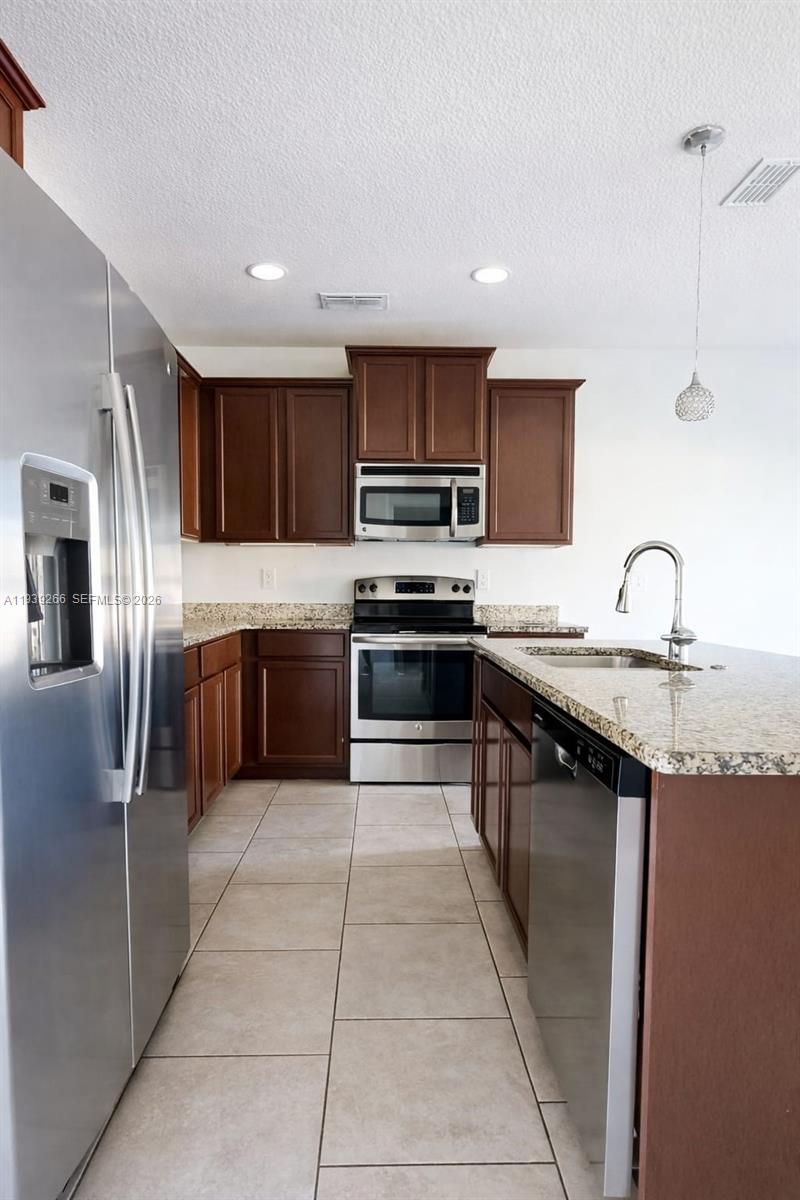 TUSCANY TOWNHOMES - Residential