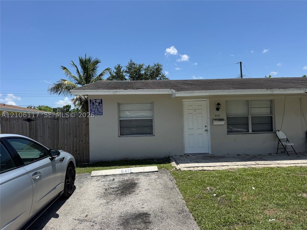 Photo of 5410 NW 16th St #1, Lauderhill, FL 33313 (MLS # A12106117)