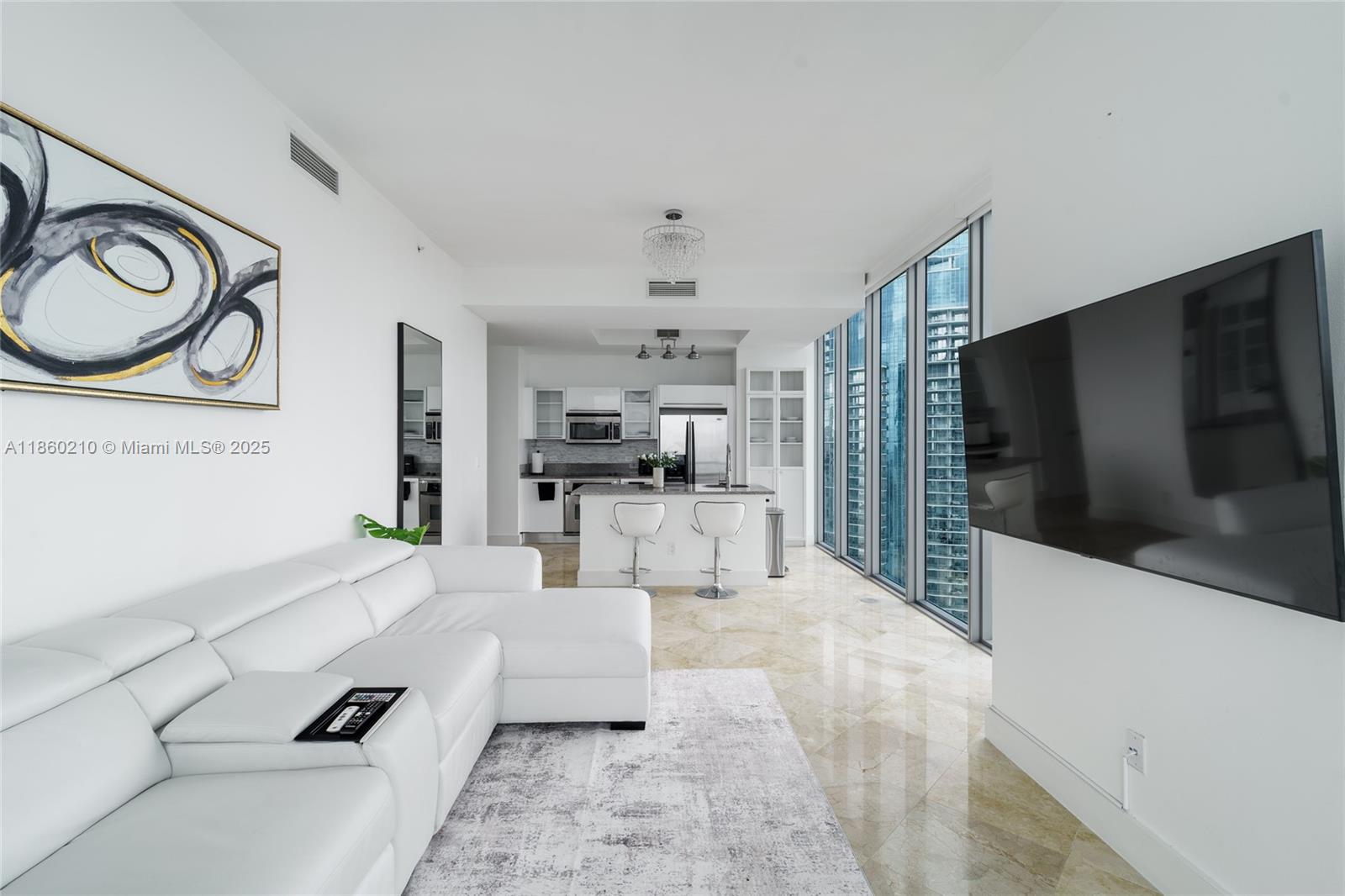 Experience the epitome of luxury living in this stunning, fully furnished apartment with breathtaking views, in the heart of downtown. The master bedroom is a sanctuary, featuring spectacular sunset through floor-to-ceiling windows. Step out onto one of the two balconies—one with panoramic city views and the other with mesmerizing water views. The apartment features floor-to-ceiling windows equipped with motorized blackout shades, Nest thermostat, and WiFi-controlled smart light switches. The amenities are second to none, including two expansive pools, a volleyball court, Jacuzzi/hot tub, BBQ grills, fully equipped gym, a mini-market, 24/7 concierge and security, storage room. 10 minutes from the beach, Brickell's vibrant restaurants and nightlife. 1st month and 2 security deposit.