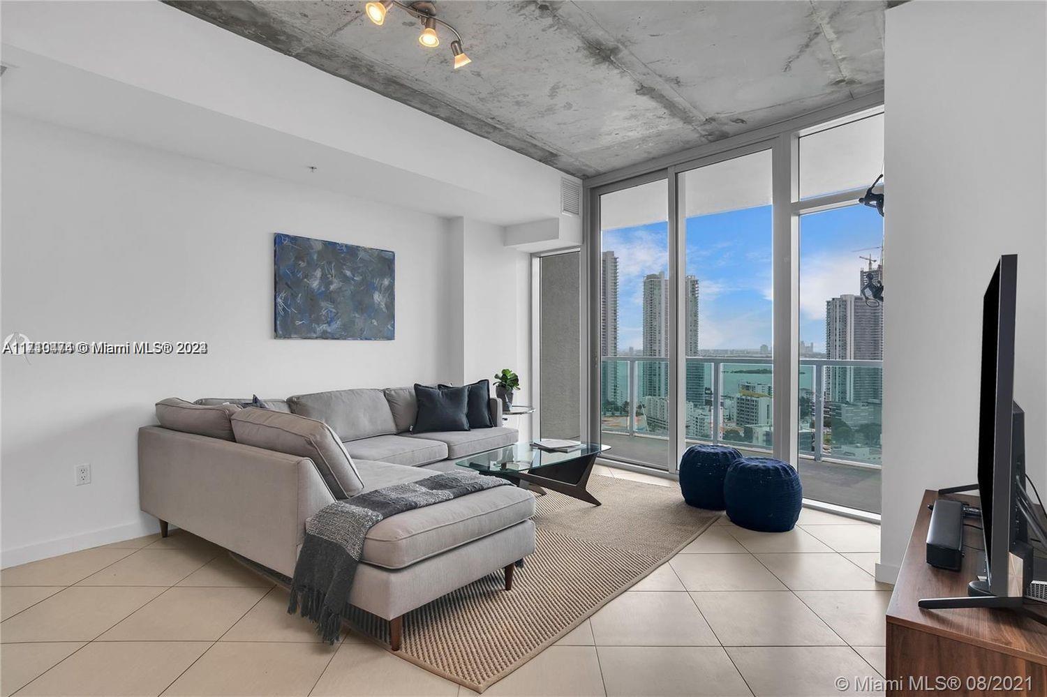 Modern industrial condo at Midtown 4, One bedroom, 1.5 baths, with amazing views of the bay and city. Floor to ceiling impact windows, stainless steel appliances, washer/ dryer in unit. Unfurnished. Amenities include: Concierge, 24 hour security, parking, rooftop pool, hot tub, sauna, fitness center, BBQ area, on-site management. Cable and Internet included. Location is unbeatable- walking distance to restaurants, shopping, bars, and neighboring Design District and Wynwood. Pet Friendly. Available to show starting January 6th . Please note that broker fees are paid by landlord. Also available for 6 months as well.