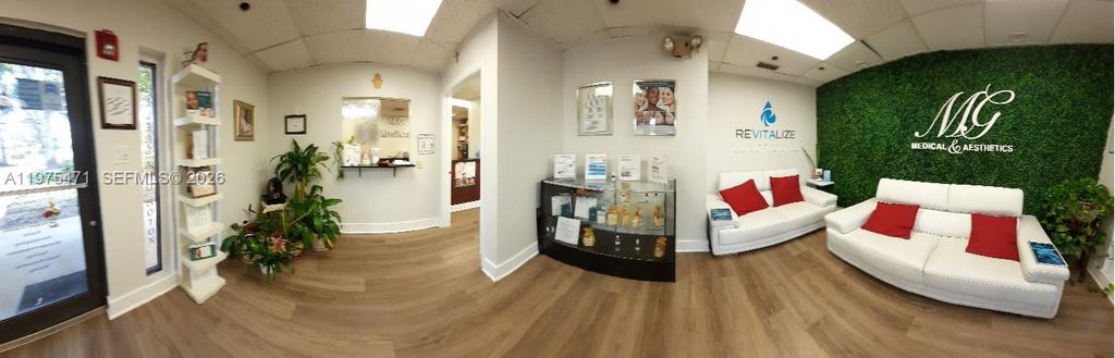 Photo of 1821 NW 123rd Ave, Pembroke Pines, FL 33026 (MLS # A11975471)