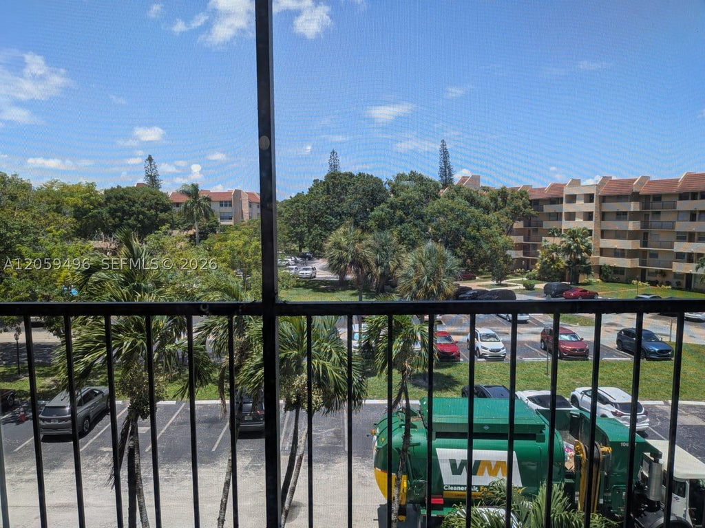 Photo of 3821 Environ Blvd #406, Lauderhill, FL 33319 (MLS # A12059496)