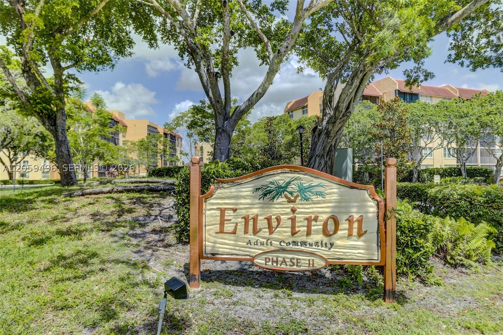 Photo of 3821 Environ Blvd #406, Lauderhill, FL 33319 (MLS # A12059496)