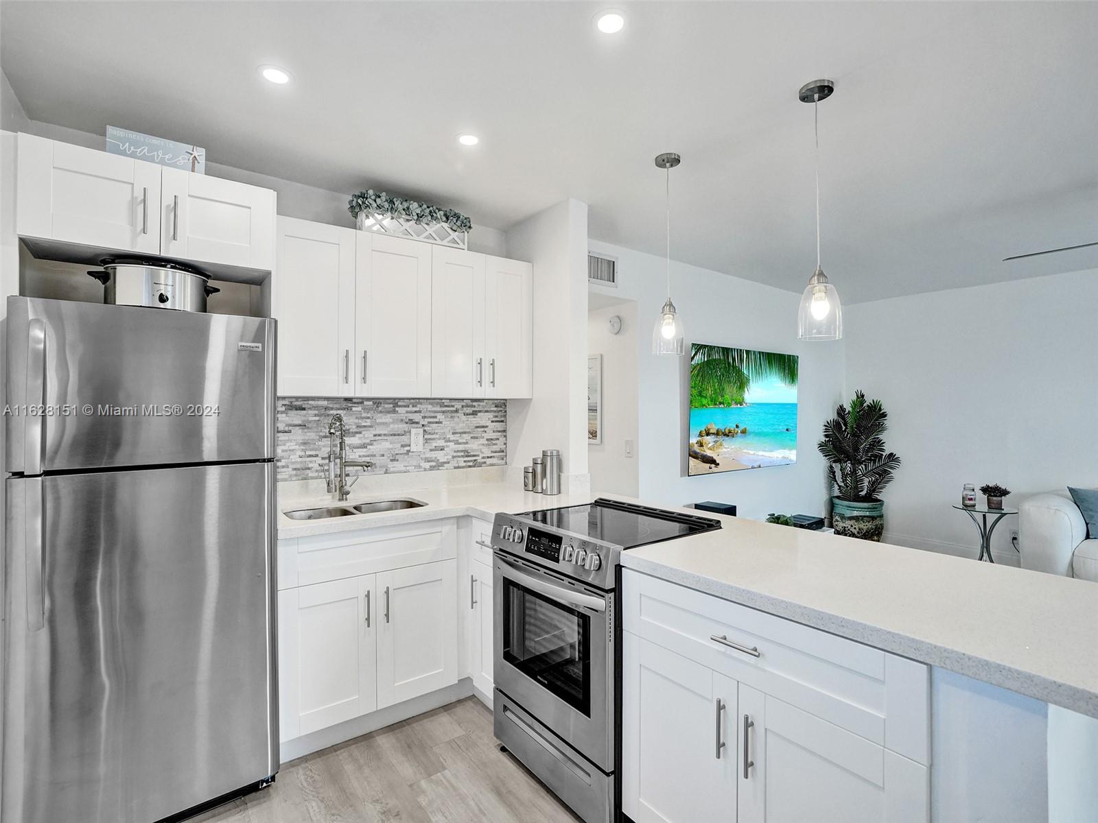 What a deal! Turn-key Furnished & beautifully renovated! Welcome home to this beautiful & bright updated condo in the vibrant 55+ resort-style Kings Point Delray. Home is elegantly appointed, featuring classic white shaker cabinets, quartz counters, stainless steel appliances, new gray vinyl waterproof plank flooring, no popcorn, updated bathrooms, in-unit Laundry w/new washer, '23 WH, '22 AC & walk-in closet in primary. Enjoy your morning coffee on your screened patio. Unit is very close to lift! Kings Point is a 55+ country club style community, including two 18-hole golf courses, clubhouse, theater, fitness center, billiards, indoor pool, many outdoor pools, tennis courts, pickleball, bocce, cafes/restaurant. NO LEASING FOR 2 YEARS AFTER OWNERSHIP, 700 credit score.