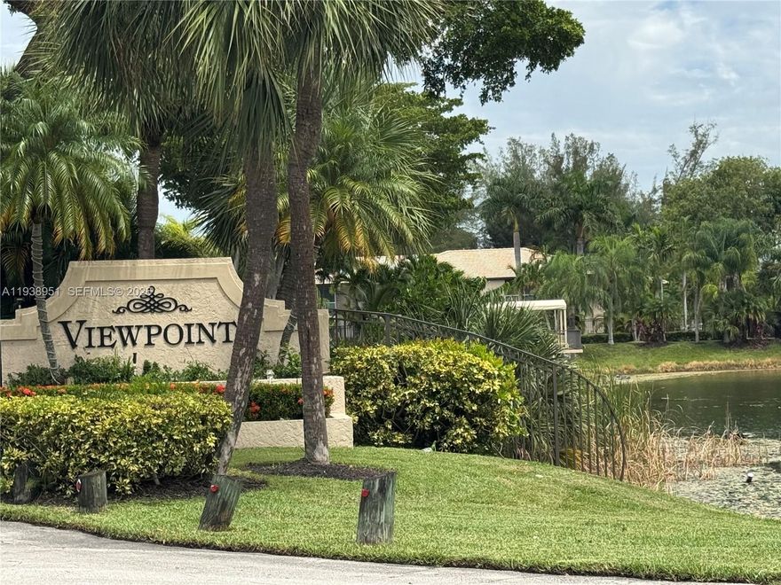 BEST PRICE IN DEVELOPMENT for FAST SALE ... Have INSTANT EQUITY as recent appraisal came in MUCH HIGHER than selling price.  This 2/2 has MODERN KITCHEN & UNIT HAS SOARING CEILINGS that you will just LOVE.   Washer & Dryer in unit!! RELAX on your BALCONY & relish in the quiet and serenity as you watch the palm trees sway.  Walk to LEMON TREE LAKE which is just outside your gate, This is where you can launch your KAYAK or STAND UP board. SECURE GATED COMMUNITY with Beautiful SPARKLING POOL is waiting for you to JUMP IN & COOL OFF. Newer kitchen with GRANITE countertops, all STAINLESS STEEL APPLIANCES, plank flooring in main areas. SOFT CARPET in the bedrooms. NEWER ELECTRIC CIRCUIT BREAKER PANEL, HOT WATER HEATER  & A/C .ALL WINDOWS COVERED for HURRICANE as well. LARGE CLOSETS &PLENTY of storage including outdoor storage too.