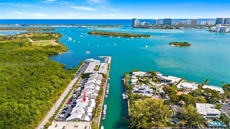 Discover an extraordinary rare waterfront retreat in Hidden Cove, an exclusive gated enclave of just 22 fee-simple townhomes. This designer 2-bed, 2.5-bath residence showcases a top-to-bottom renovation: high-end Italian tile flooring, new roof, impact windows, new doors, new ceilings, updated AC system with new air ducts, designer bathrooms, custom kitchen, and premium appliances.
Positioned at the end of a serene canal, direct ocean access to Biscayne Bay, your private community dock awaits (first come first serve rental)—launch your kayak & reach Raccoon Island in just 10 minutes or explore Oleta River State Park's 15 miles of pristine waterways. Adjacent to protected Arch Creek East Environmental Preserve, you're surrounded by natural treasures: Owl Island, Osprey Triangle, & Tarpon Tidal Pool. Walk, bike, or paddleboard through 13-acre sanctuary featuring trails, mangroves, & abundant wildlife.
Unmatched location—multiple marinas on your street, including slips & boat club, protected preserve views ensuring long-term value, and North Miami's fastest-appreciating neighborhood. A very low $400/month HOA covers exterior maintenance, landscaping, and garbage. New impact windows & roof dramatically reduce insurance costs—a critical advantage in 2026 Florida.
This isn't just a home—it's a private waterfront lifestyle. Wake to bay views, paddle at sunrise, explore nature trails, and return to your modern sanctuary. Minutes from Miami's energy yet worlds away in tranquility.