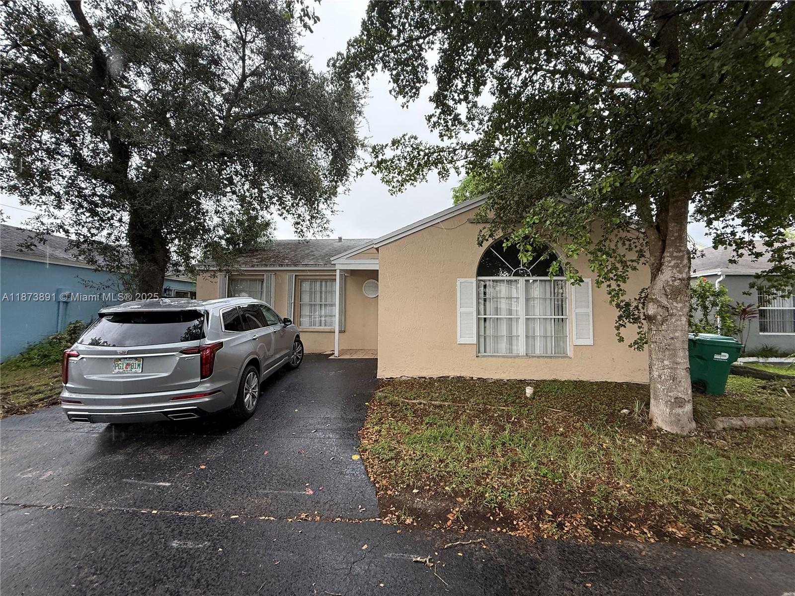 This well-maintained 3-bedroom, 2-bathroom home offers 1,369 sq ft of comfortable living space and features its own private backyard—perfect for relaxing or entertaining guests. Located in a family-friendly community with access to a community pool, the property is just minutes away from Walmart, a variety of restaurants, the Miami Metro Zoo, and the Florida Turnpike. It’s also a short drive to Jackson Hospital. Don’t miss out on this conveniently located and inviting home! ATTENTION AGENTS, a 24-hour notice is required for showing!