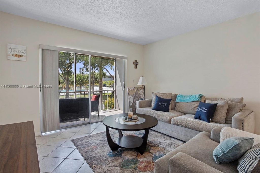 Photo of 4900 Washington St #204, Hollywood, FL 33021 (MLS # A11365559)