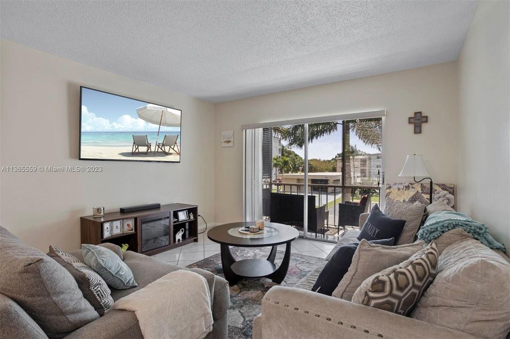 Photo of 4900 Washington St #204, Hollywood, FL 33021 (MLS # A11365559)