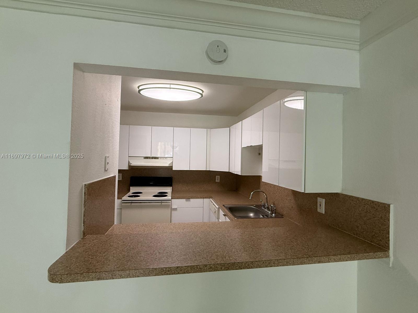 Property for Sale at 7000 Nw 186th St 4-114, Hialeah, Miami-Dade County, Florida - Bedrooms: 2 
Bathrooms: 1  - $269,500