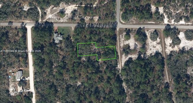 Vacant Residential zoning land. Two parcels combined 0.48 acres.