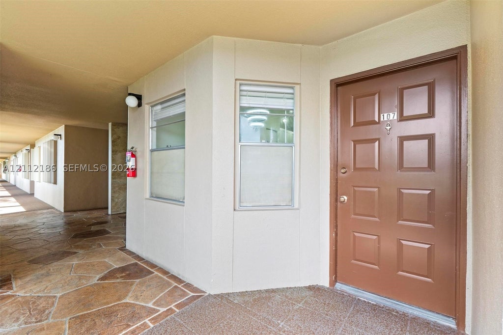 Photo of 1300 SW 124th Ter #107P, Pembroke Pines, FL 33027 (MLS # A12112186)