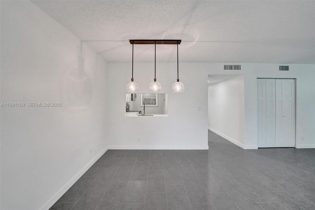 Photo of 9330 Lagoon Pl #109, Davie, FL 33324 (MLS # A11991109)