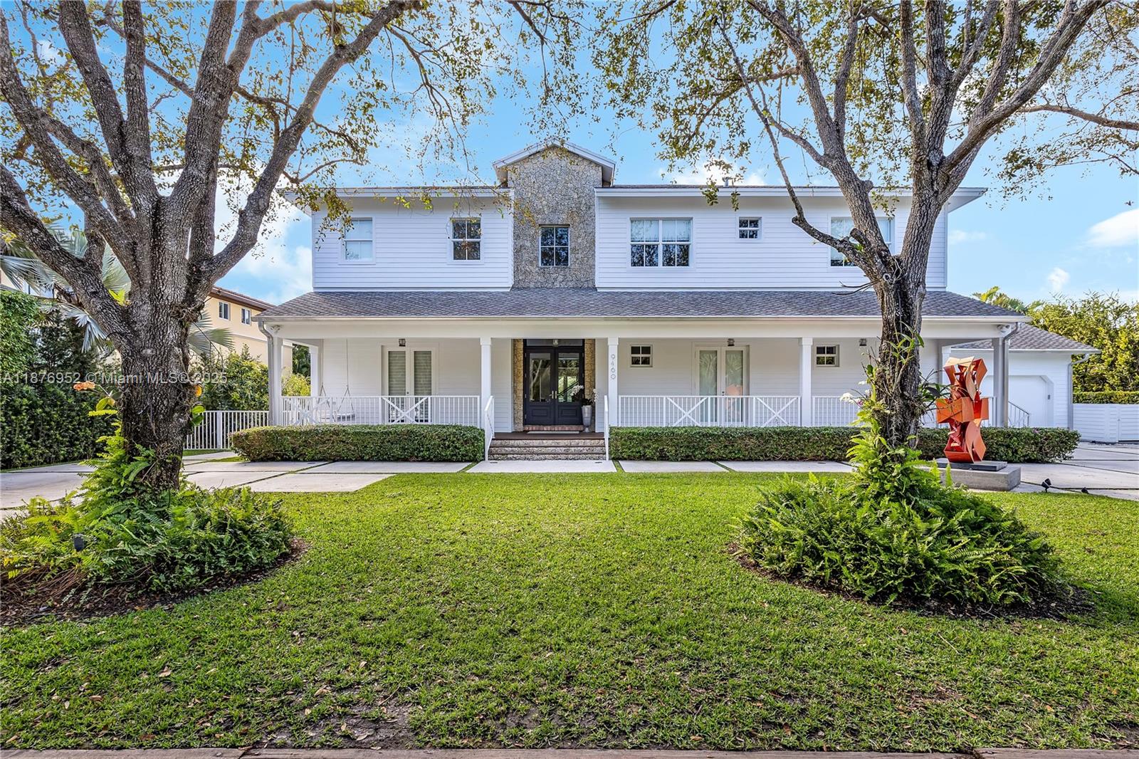 Beautiful Pinecrest residence offering the perfect balance of Miami’s warm exterior style with a sleek modern approach inside. Features include Sub-Zero, Miele, DCS, and KitchenAid appliances, soaring double-height ceilings, and a private guest room with independent access. The pool with new waterline and lush privacy hedge create an inviting setting for relaxation and entertainment. The home is fully integrated with a Sonos sound system and wired security cameras. Conveniently located near top-rated schools including Gulliver, Pinecrest Elementary, St. Louis, Riviera, and Palmetto Senior, with easy access to Palmetto Bay, highways, and US-1.