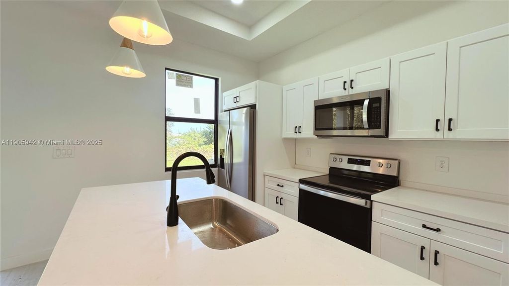 Photo of 2615 68th st w, Lehigh Acres, FL 33971 (MLS # A11905942)