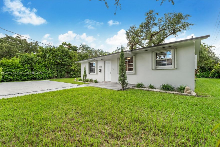 Charming fully furnished 3BR/2BA home in the highly desirable South Miami “City of Pleasant Living,” situated on an oversized corner lot with a desirable split floor plan. Recently updated, this residence features a galley-style kitchen with granite countertops, subway tile backsplash, and newer appliances. Additional interior features include neutral gray flooring, abundant closet space, upgraded interior and exterior doors, updated tile, and newer light fixtures. Major improvements include a new 2024 roof, 2022 A/C, washer & dryer, accordion shutters, & refreshed landscaping. The fully fenced backyard offers privacy, mature fruit trees, and ample space for outdoor enjoyment, pool, or future expansion. Move-in ready and offered fully furnished.