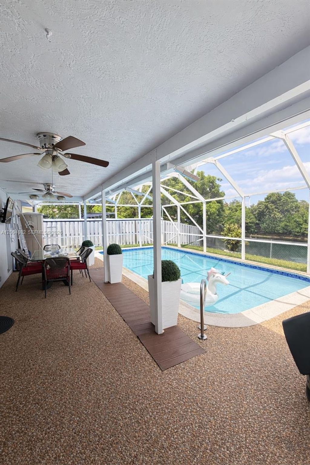 Photo of 8085 NW 21st St, Sunrise, FL 33322 (MLS # A12004082)