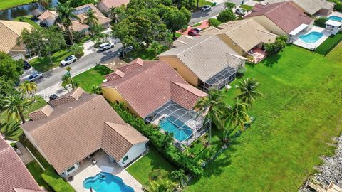 Photo of 12436 SW 1st St, Coral Springs, FL 33071 (MLS # A12049657)