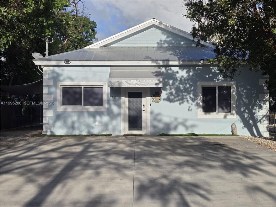 Excellent cul-de-sac 3-bedroom 2-bathroom ground level home. Built in 2018. Located in an X ZONE. Spacious lot with plenty of room for parking, and a concrete slab off the side of the home for your RV which includes RV hook up. Impact windows and metal roof. The backyard features a paved brick patio with a beautiful Tiki Hut. Excellent storage sheds. Inside you will find porcelain large floor tiles, crown molding throughout and high ceilings with recessed lighting. Large master bedroom with a walk-in closet. The open concept kitchen features all stainless-steel appliances, quartz countertops. Large dining area and laundry room. NO HOA. Beautifull bathrooms. Located in the heart of Key Largo, close to Jacob's Aquatic Center, John Pennekamp Park, Publix, and great restaurants!  Available after July 1st, 2026.