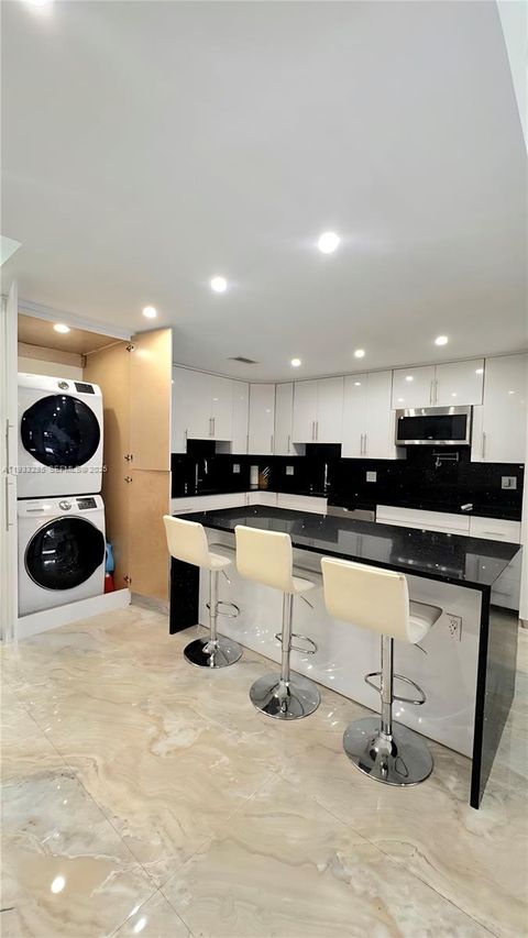 Photo of 620 Briarwood Cir #1-43, Hollywood, FL 33024 (MLS # A11933285)