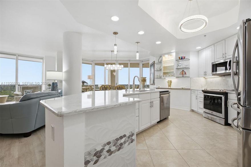 NEW LISTING **COMES WITH A ONE YEAR HOME WARRANY** | 10th-floor, fully furnished luxury condo at North Star Yacht Club with breathtaking Caloosahatchee River, marina, and sunset views. This 3-bed, 2.5-bath residence features two expansive balconies, floor-to-ceiling impact windows, designer finishes, gourmet quartz kitchen, open-concept living with fireplace, and a private primary suite with spa-style bath. Includes 2 indoor parking spaces + 2 storage units. Resort-style amenities span 12.5 acres with clubhouse, Olympic pool, fitness center, courts, marina access, dining, and more—minutes to the Fort Myers River District. Premier waterfront living at its finest.