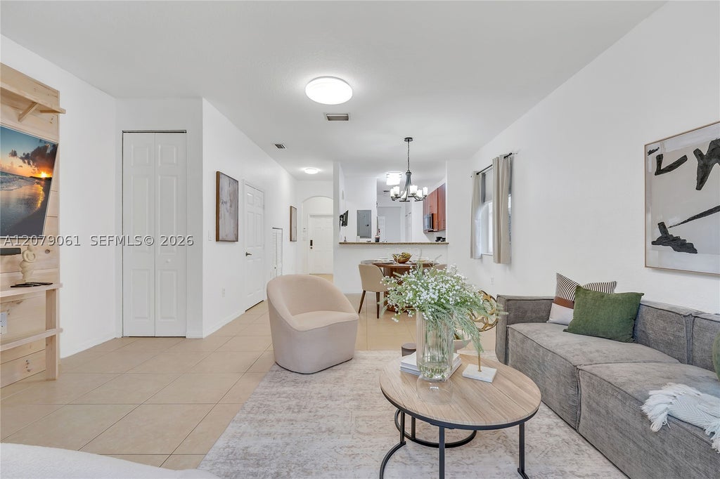 Photo of 8999 SW 18th St #1401, Miramar, FL 33025 (MLS # A12079061)