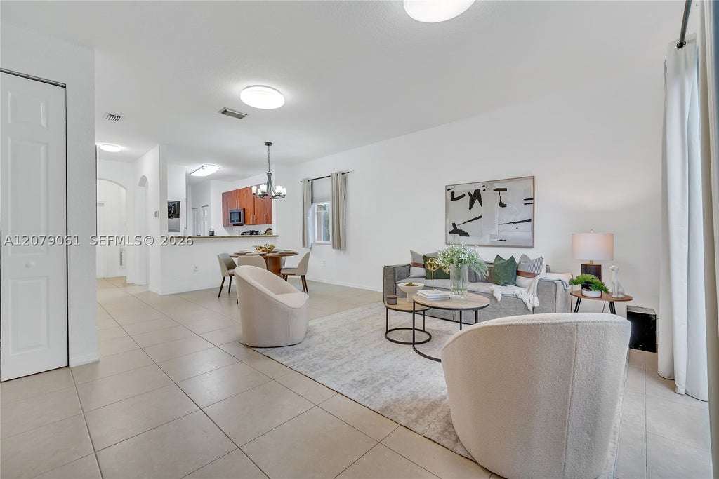 Photo of 8999 SW 18th St #1401, Miramar, FL 33025 (MLS # A12079061)