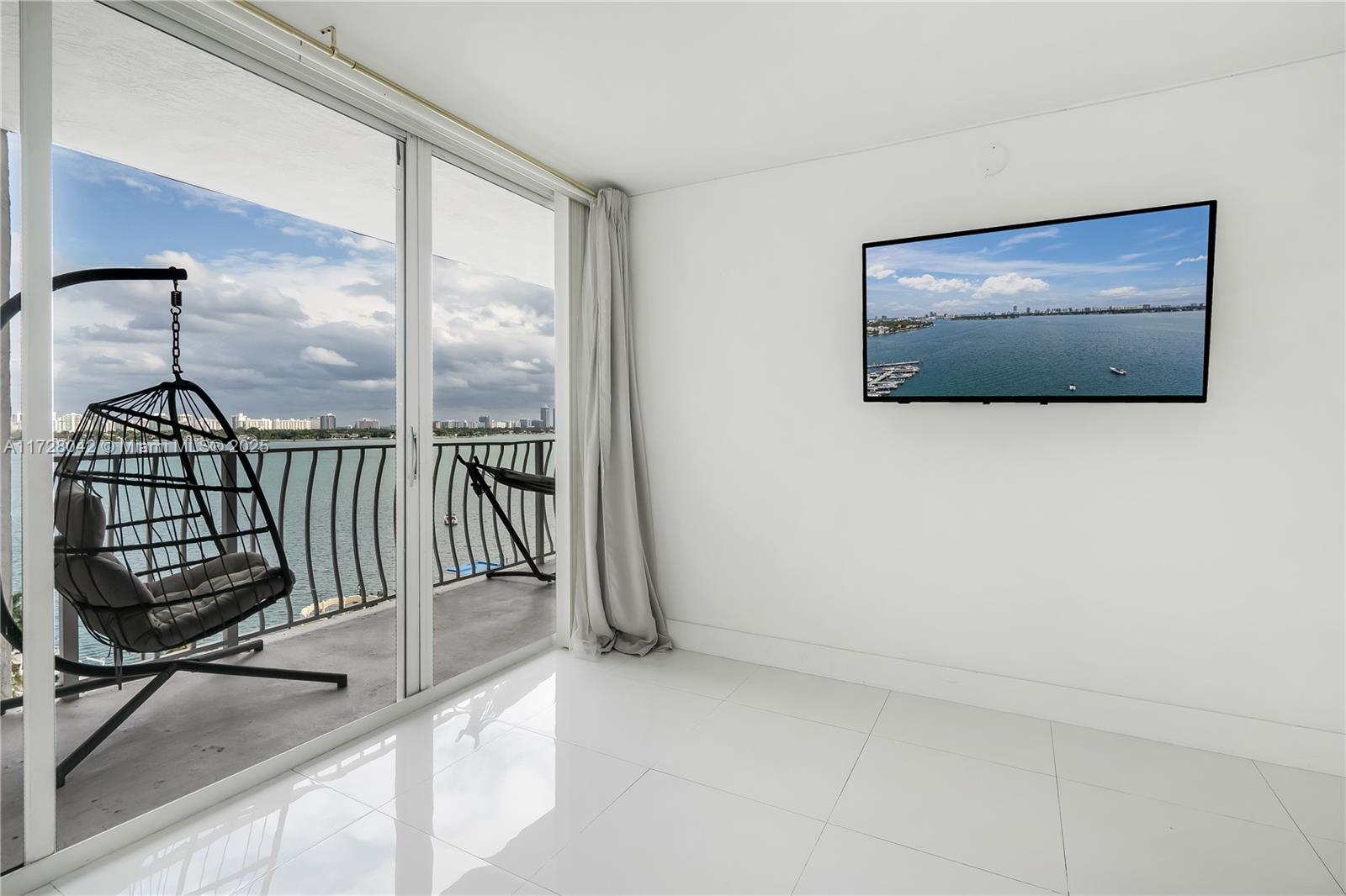 This exquisite condo offers a perfect blend of modern comfort and waterfront luxury living. Situated in the heart of North Bay Village , it provides breathtaking views of the bay and beyond. This unit has been remodeled, Amazing stunning bay views and floor-to-ceiling windows, porcelain floors, fully updated bathrooms, new AC and a split bedroom floor plan with a bathroom in each bedroom that provides ample living area and privacy. The kitchen features granite countertops and new stainless-steel appliances, along with large walk-in closets and a washer & dryer inside the unit. Additionally, this is a full-amenity building with 24-hour security, pool, and a marina. The building has RESERVES qualifying for financed offers. **THIS UNIT CAN BE RENTED IMMEDIATELY. VACANT AND READY FOR MOVE IN