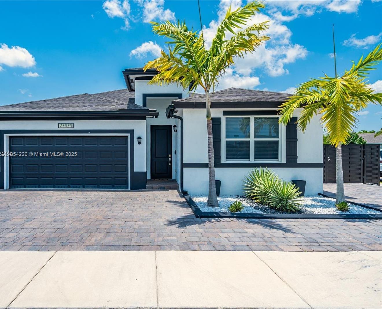 Stunning and spacious 4 Bedrooms, 2 Bathrooms corner single-family home. LED lighting throughout, upgraded appliances, pantry room, and beautiful quartz countertops. A magnificent 10x30 saltwater pool, equipped with an automated system, heater, and LED lights, is situated on the modern design terrace for relaxation and entertainment. Huge master bedroom with walking closet and oversized bathroom with shower and bathtub option. Laundry room with a high-efficiency washer and dryer. The property is fully fenced. There is enough space on the right side for a Boat or RV. Close to the Turnpike, Walmart, Amazon District. Center, Black Point Marina, and more. No HOA. Rapid approval. Well-qualified tenants only need 1st month and one month's deposit to move in. See Broker's remarks.