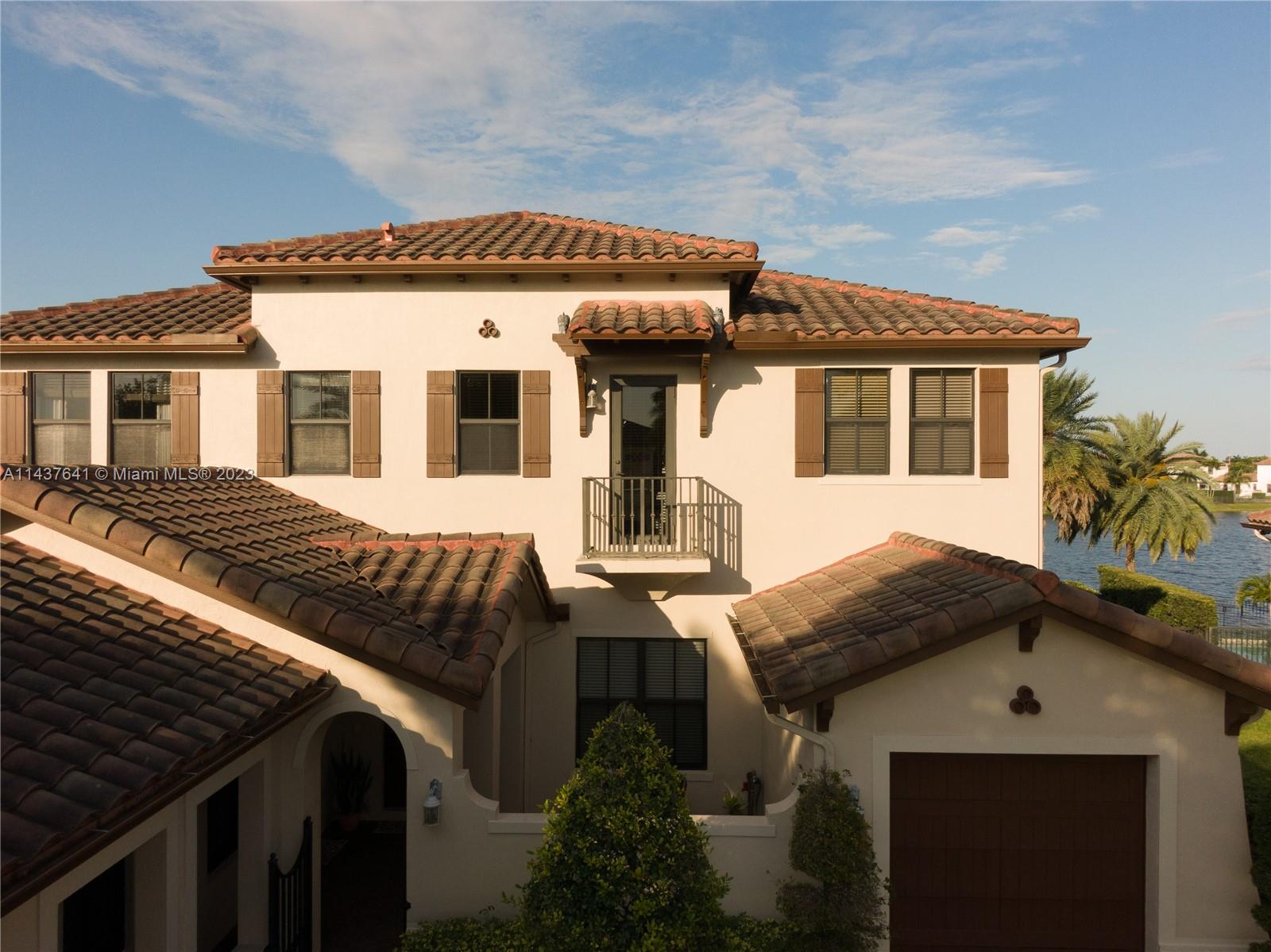 Stunning Delano Model which offers the largest floor plan featuring 5 beds, 5.5 baths, and 3 car garages in one of the most prominent waterfront lots. The community of MONTERRA holds the distinction of being Cooper City's largest constructed & most desirable Guard Gated Community. From the moment you step inside you'll be impressed by the soaring ceilings, gourmet kitchen, and luxurious master suite. Hurricane Impact windows all throughout the house. The backyard is an entertainer's dream with a lagoon-style Pool overlooking the lake. This home also features the full-blown in-law's, also called the Next-Gen Suite with separate bathroom & bedroom, but an entire living room with attached kitchenette. Open House Sunday August 27th, 2023 between 12PM and 3PM