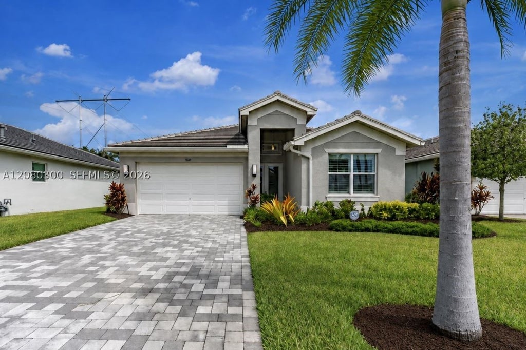 Photo of 13677 SW Oceanus Blvd, Port St Lucie, FL 34987 (MLS # A12080300)